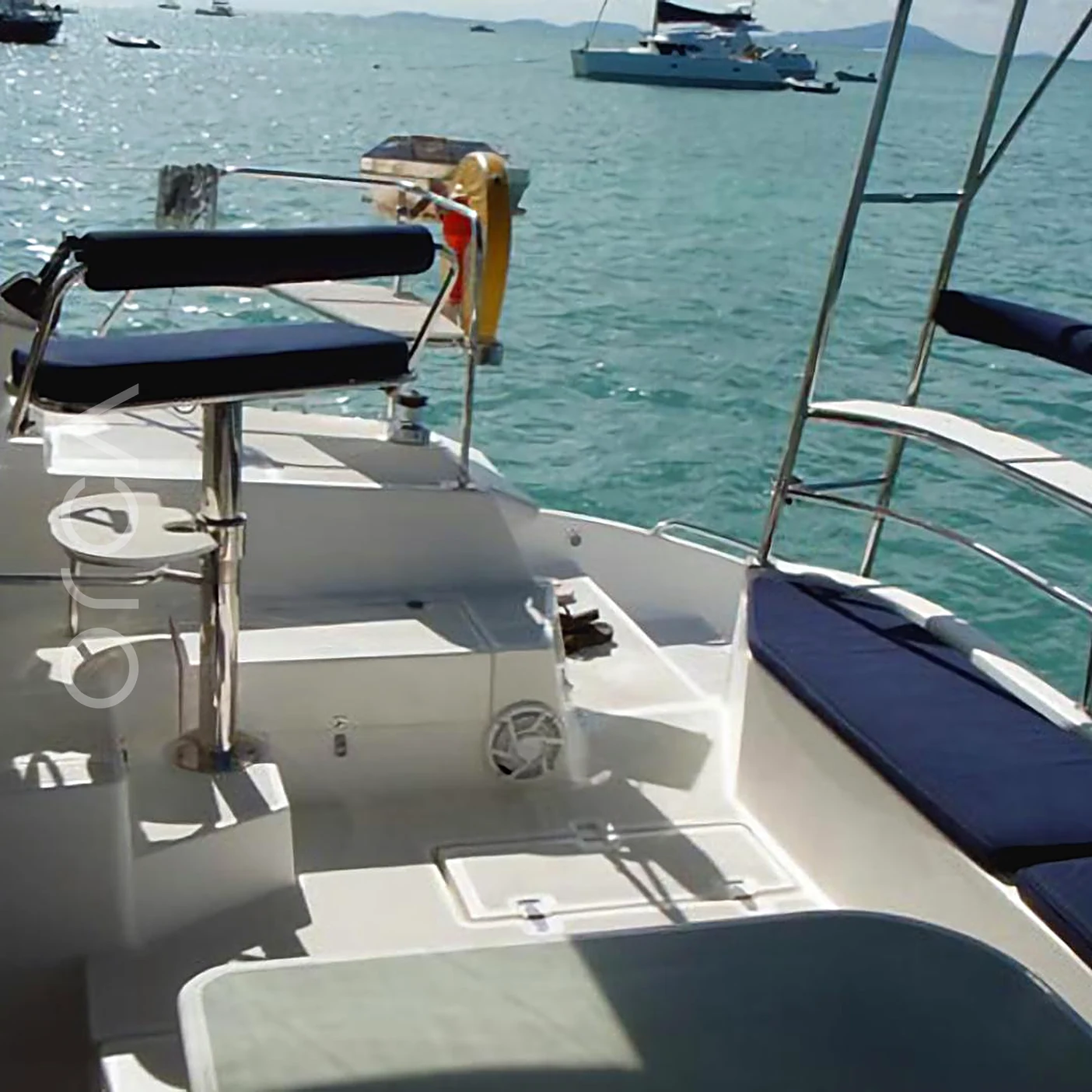 An Island Spirit 401 sailing catamaran in Mumbai, the deck where you step aboard, available to rent from Orca Sail.