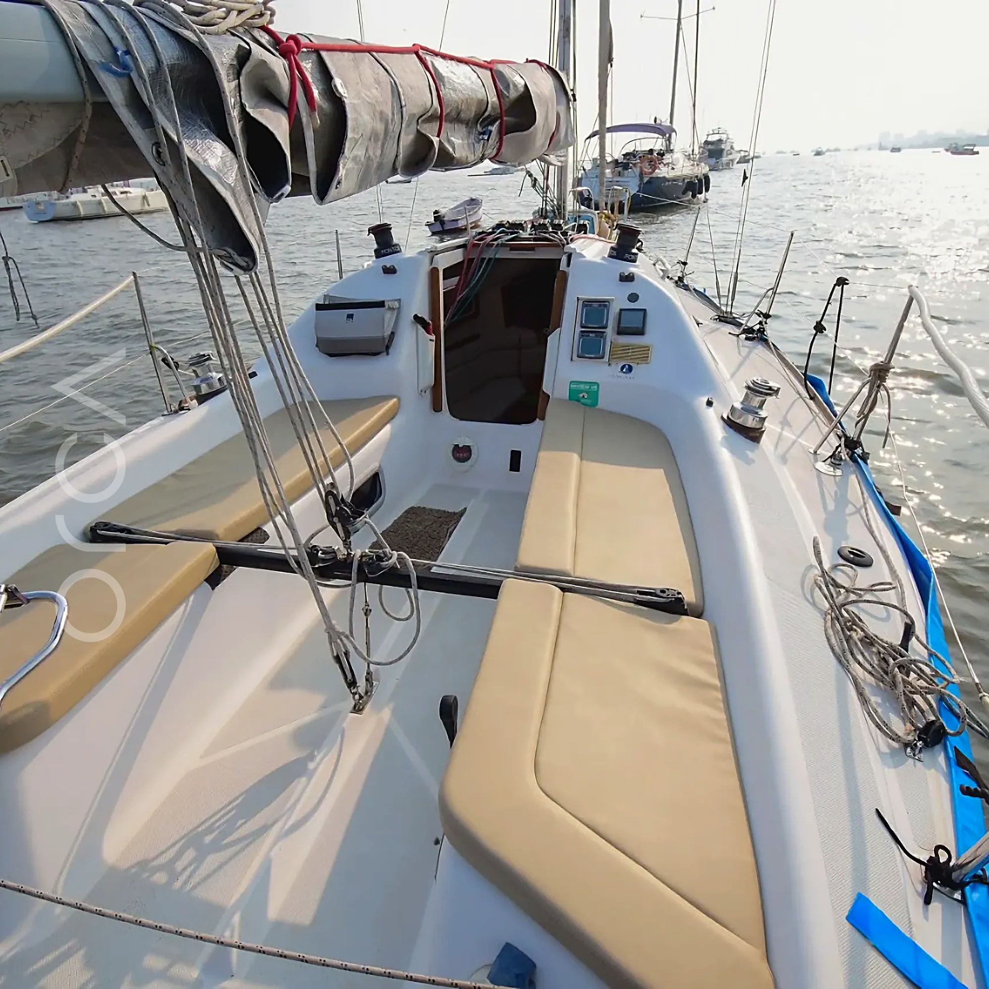 A Malbec 290 sailing yacht in Mumbai, the deck where you step aboard, available to rent from Orca Sail.