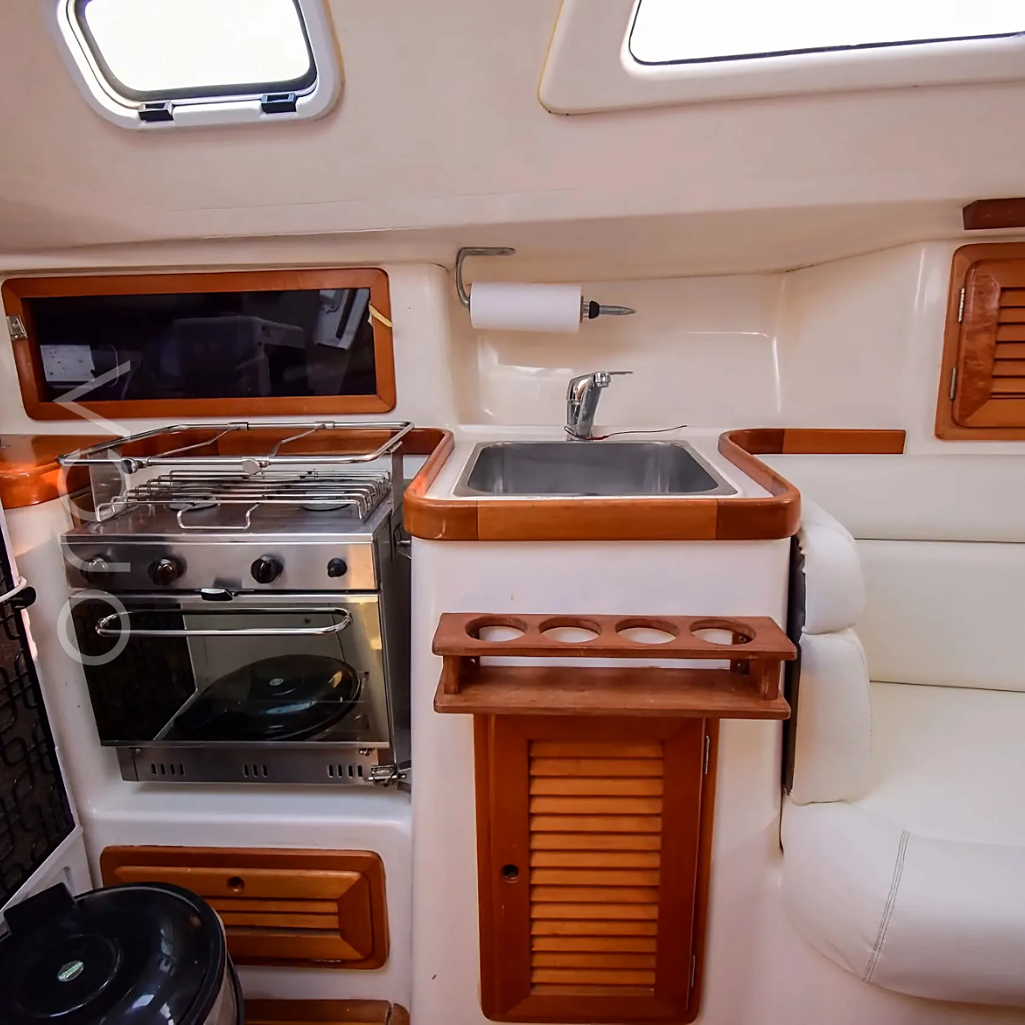 A Malbec 290 sailing yacht in Mumbai, the galley, available to rent from Orca Sail.