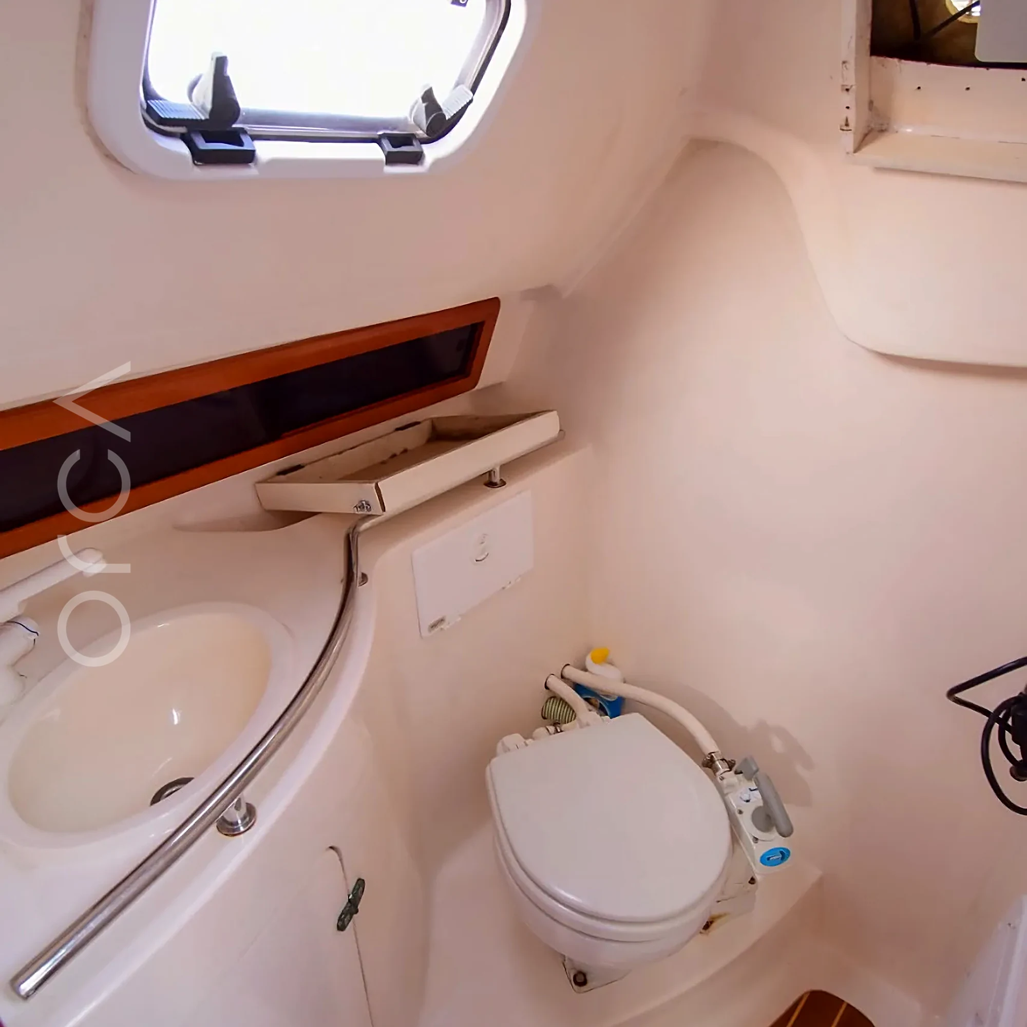 A Malbec 290 sailing yacht in Mumbai, the washroom, available to rent from Orca Sail.