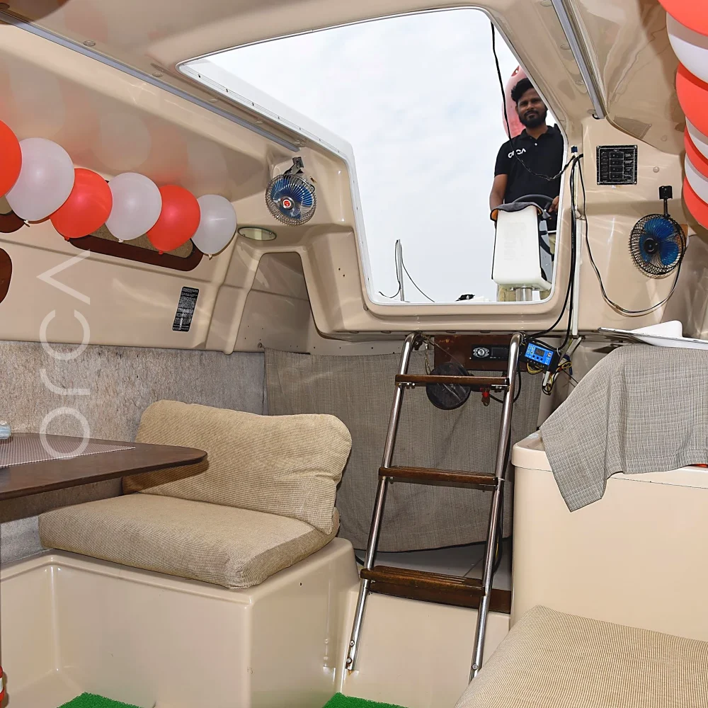 A Macgregor 26 sailboat in Mumbai, the saloon, available to rent from Orca Sail.