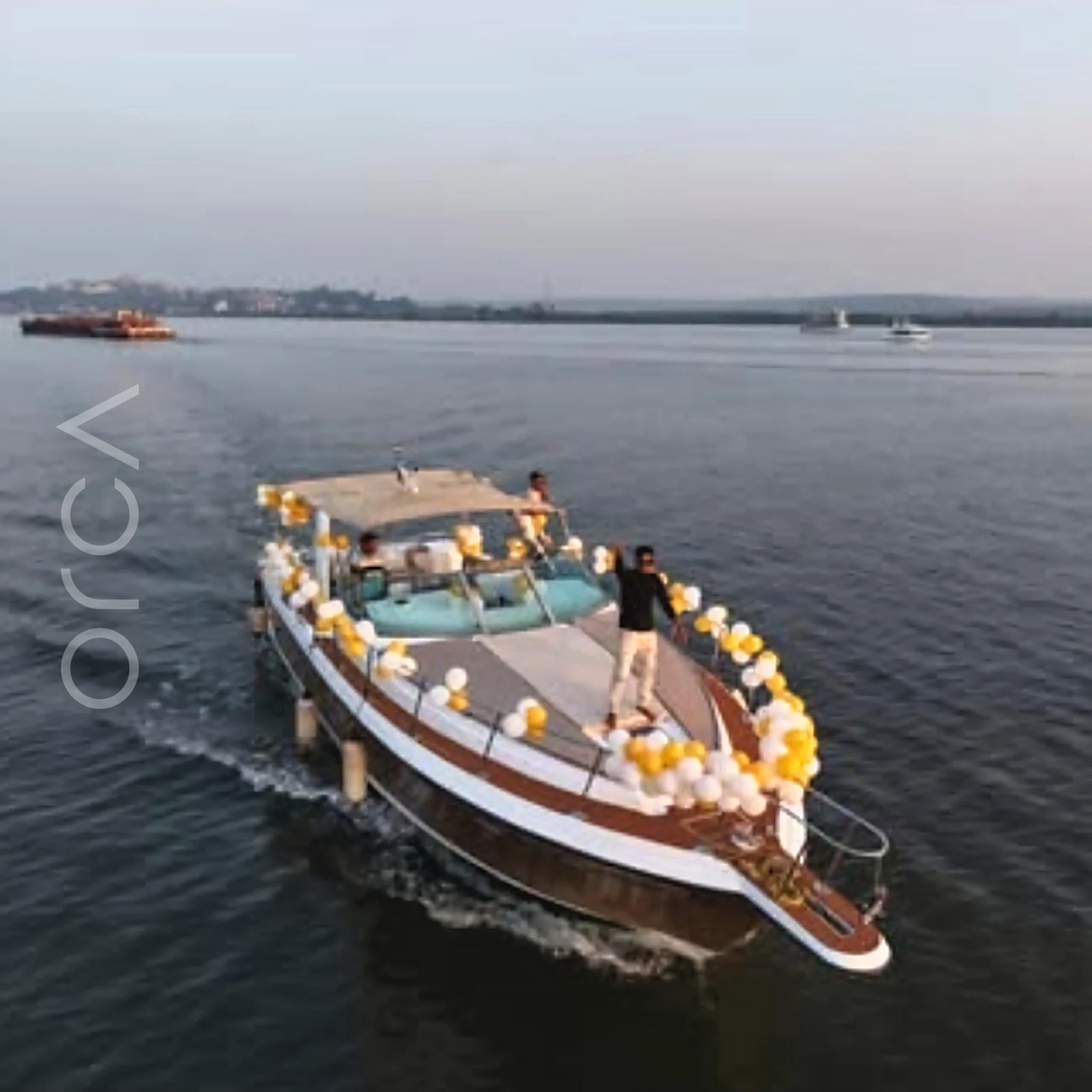A Formula 40 motor yacht in Goa, out on the water, available to rent from Orca Sail.