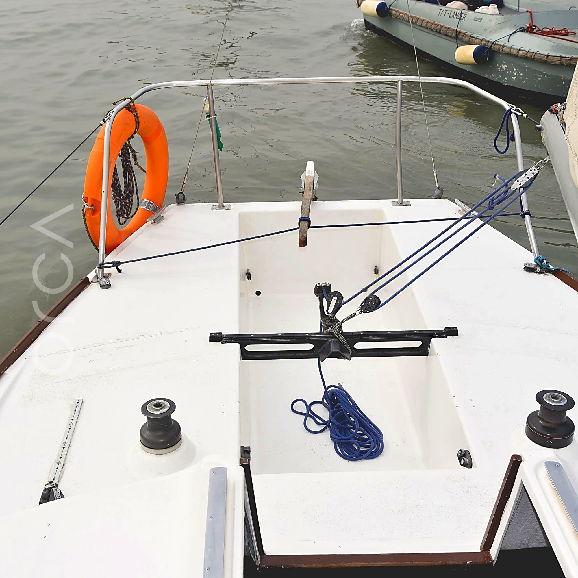 The cockpit of a J24 sailboat in Mumbai, where guests sit while sailing.