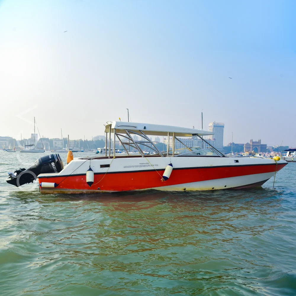 The Mahindra Odyssea speedboat on the water in Mumbai, representing the boats available to rent from Orca Sail.