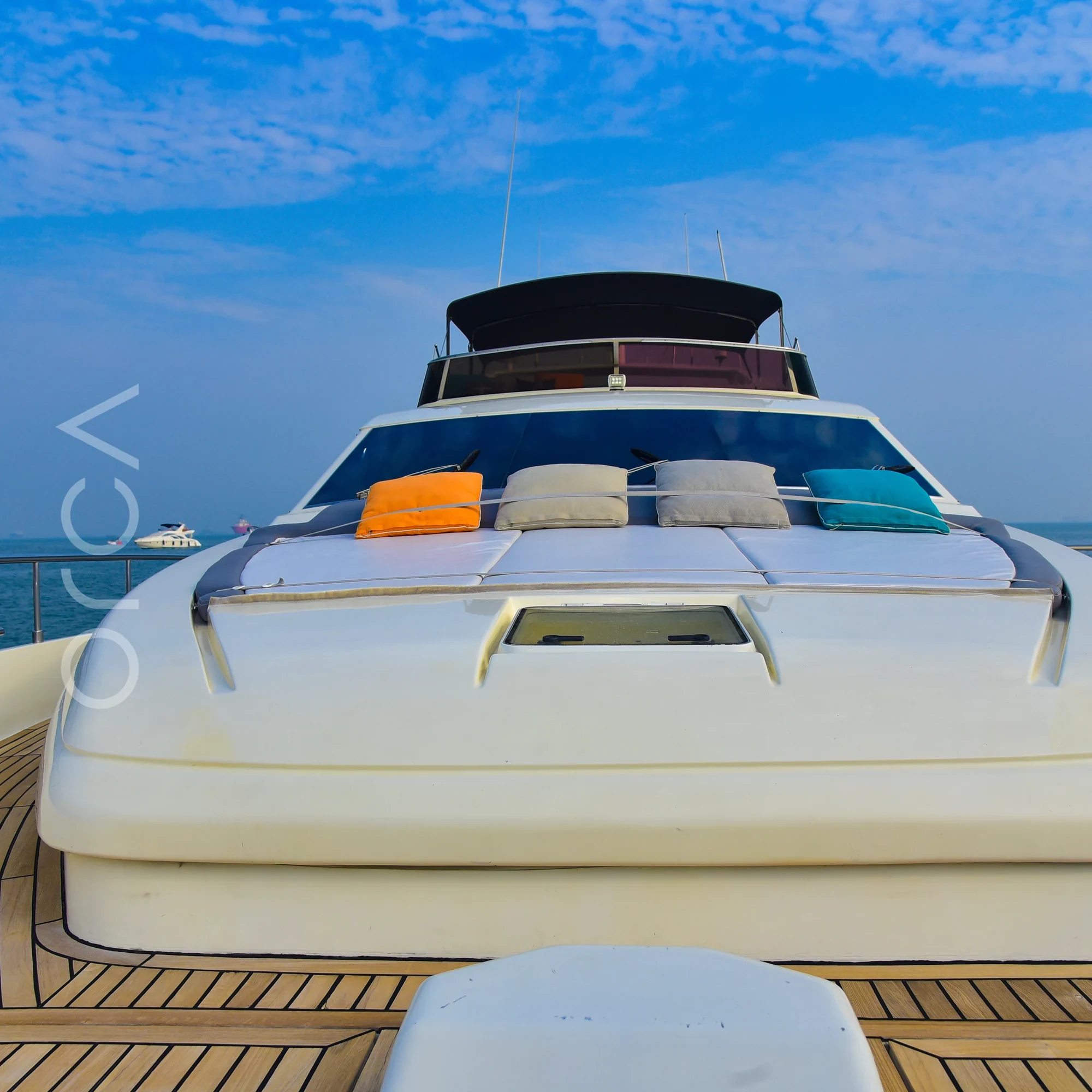 The bow deck of a Ferretti 88 luxury motor yacht in Mumbai, available to rent from Orca Sail.