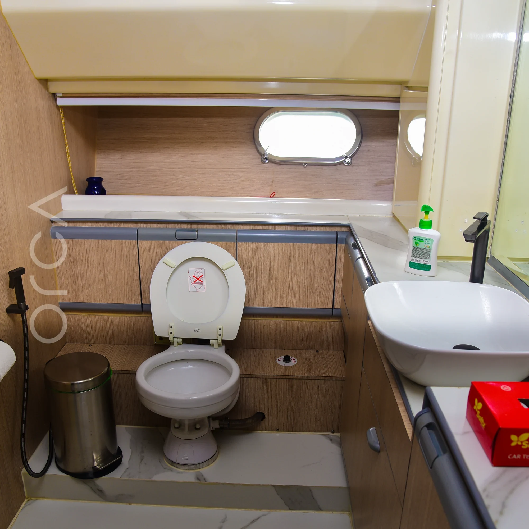 The bathroom aboard a Ferretti 88 luxury motor yacht in Mumbai, available to rent from Orca Sail.
