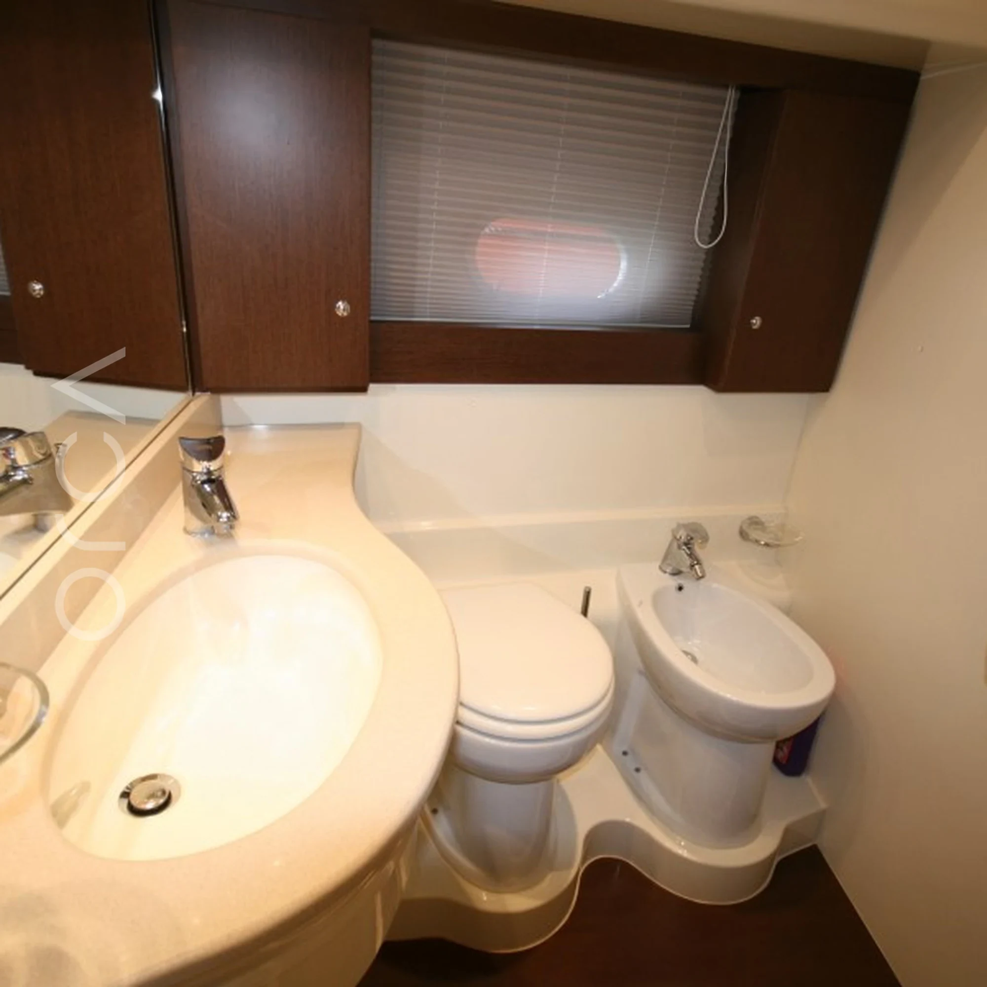 The bathroom aboard a Ferretti 550 luxury motor yacht in Goa, representing the boats available to rent from Orca Sail.