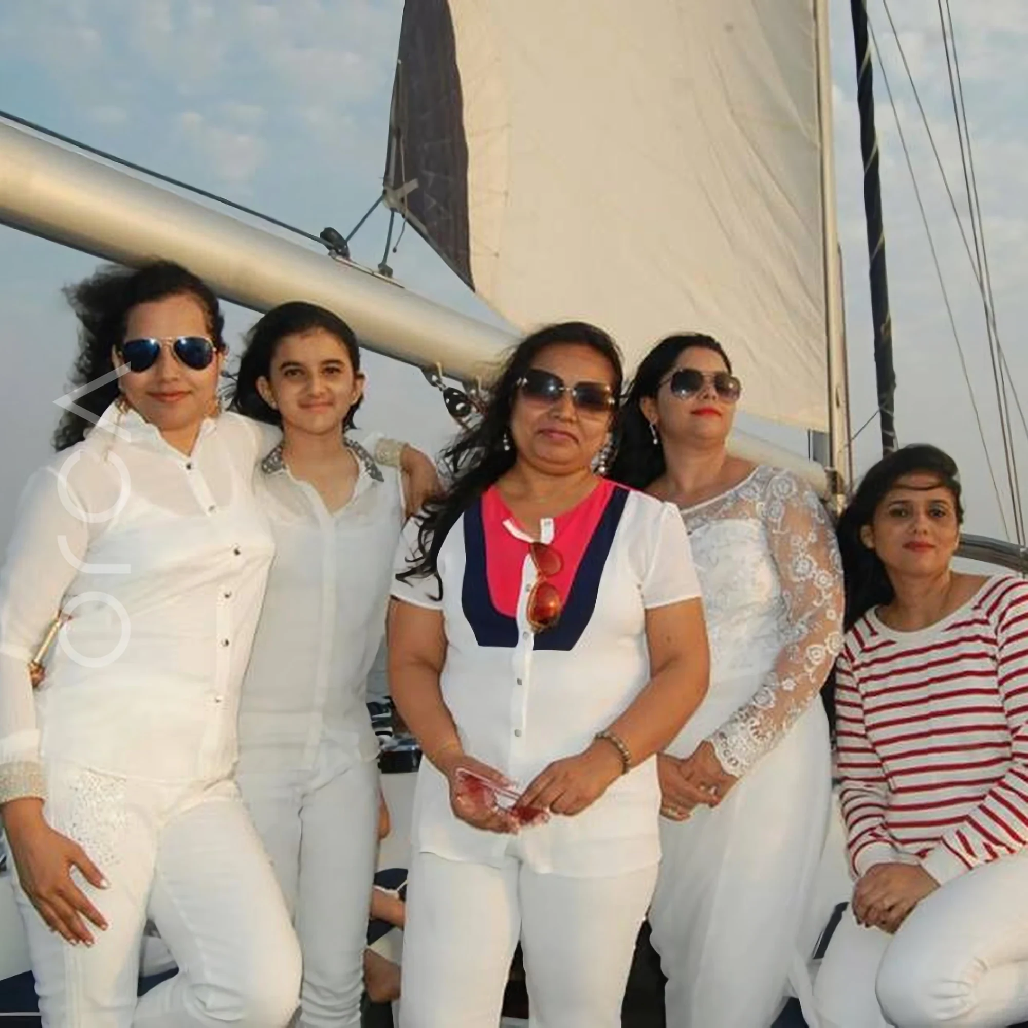Guests aboard a Lagoon 560 luxury sail yacht catamaran in Mumbai, available to rent from Orca Sail.