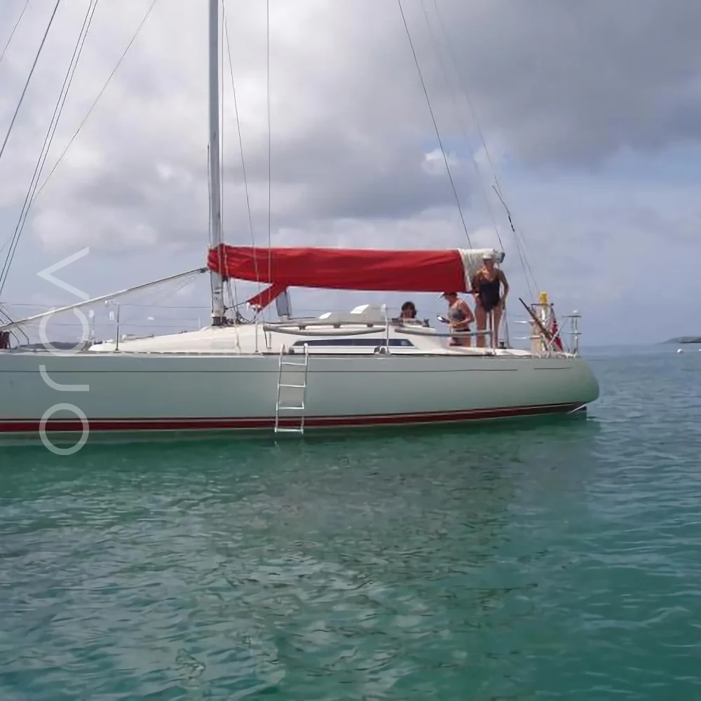 The Sigma 33 sail yacht on the water in Mumbai, available to rent from Orca Sail.