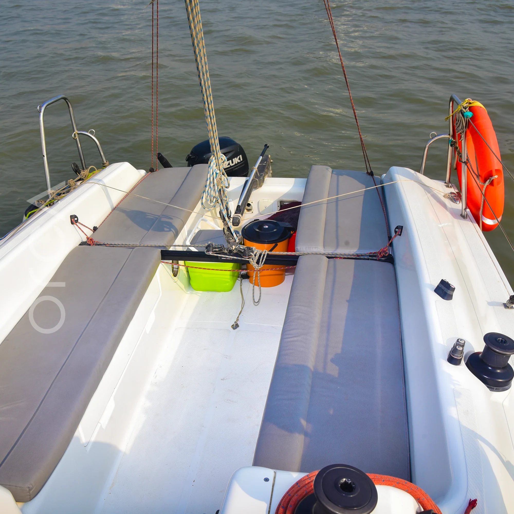 The upper deck and helm area of a Fareast 26 sail yacht in Mumbai, available to rent from Orca Sail.