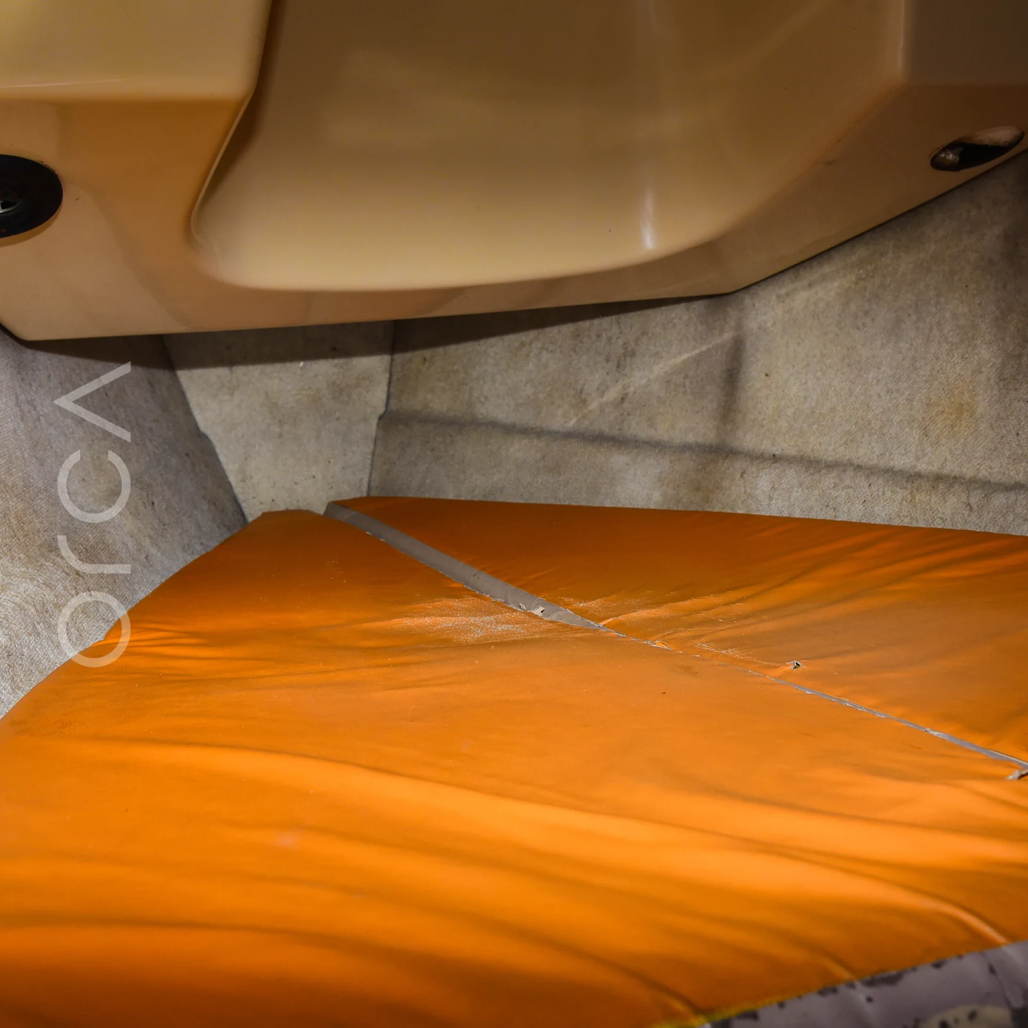 The main cabin aboard a Macgregor 26 sailboat in Mumbai, available to rent from Orca Sail.