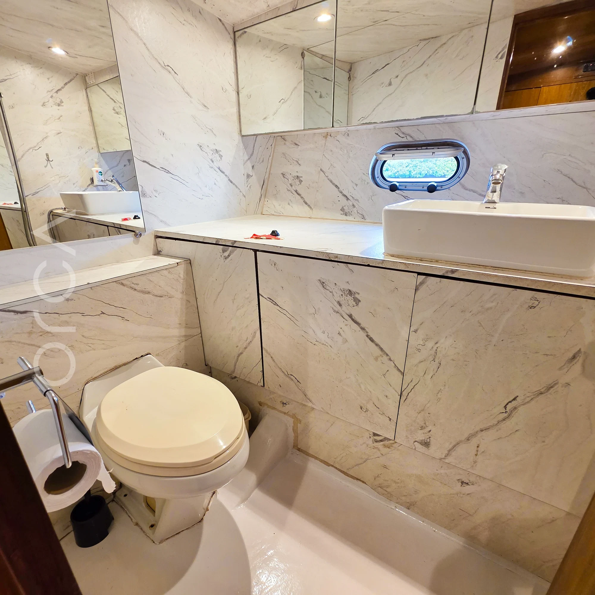 The bathroom aboard a Arc 52 cabin cruiser in Goa, available to rent from Orca Sail.