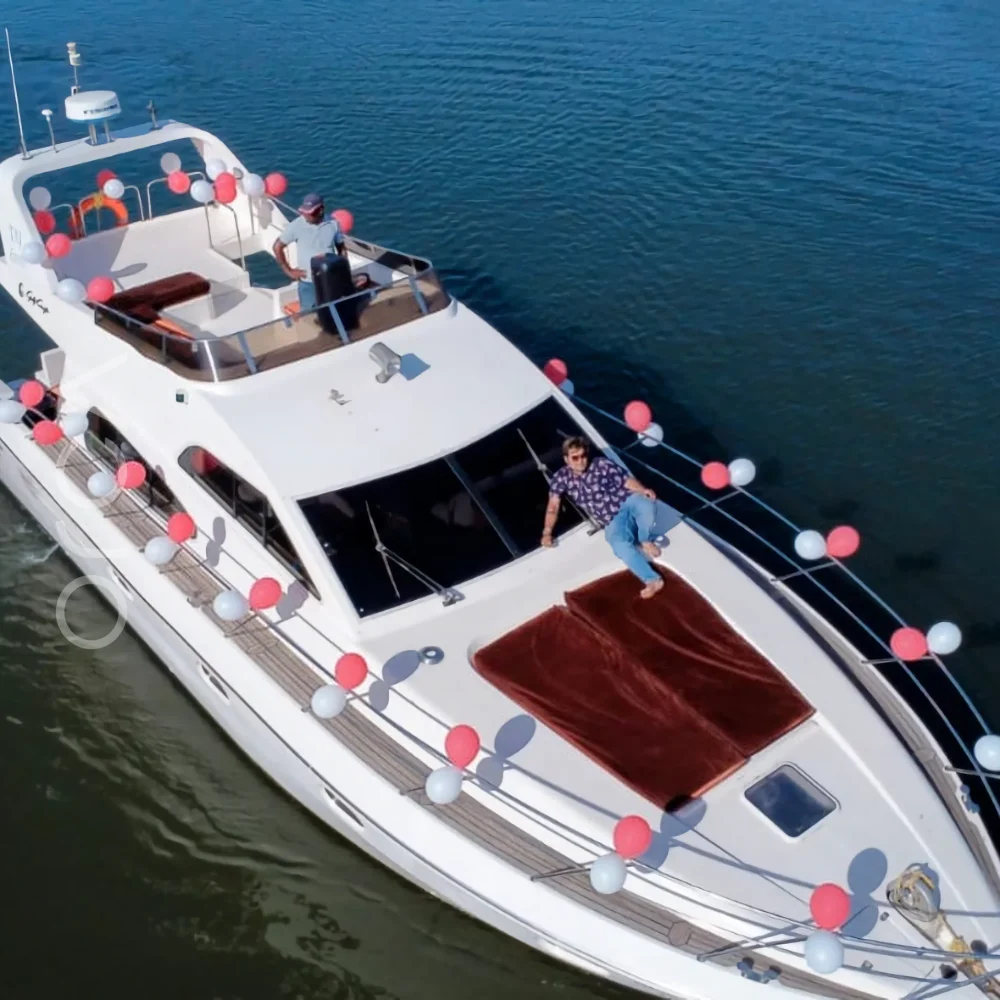 The Majesty 47 motor yacht on the water in Goa, available to rent from Orca Sail.