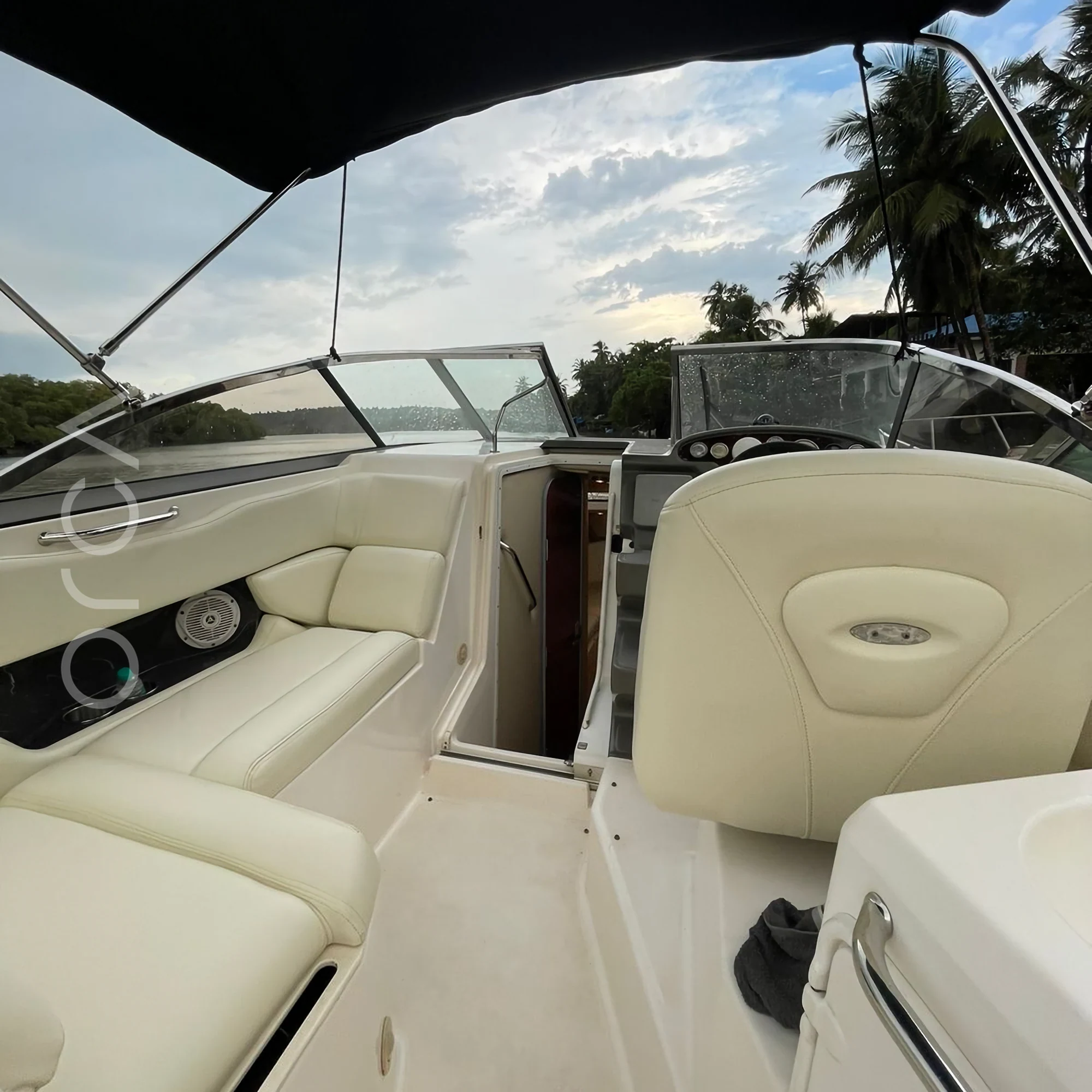 The aft deck of a Regal 2565 speedboat in Goa, available to rent from Orca Sail.