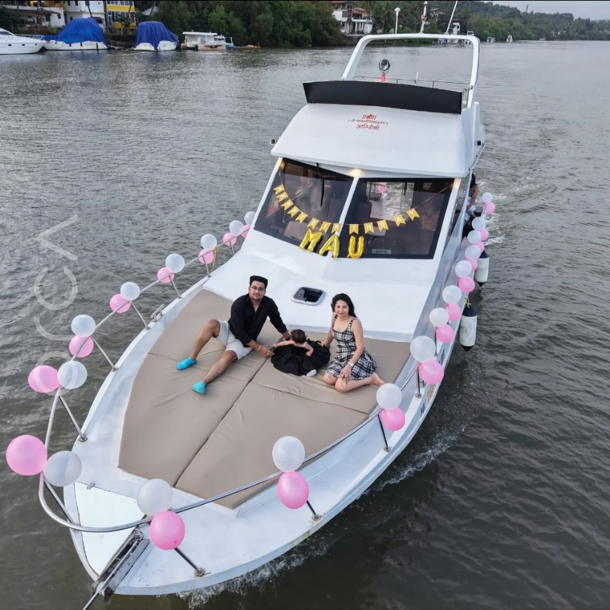 The bow deck of a cabin cruiser in Goa, available to rent from Orca Sail.