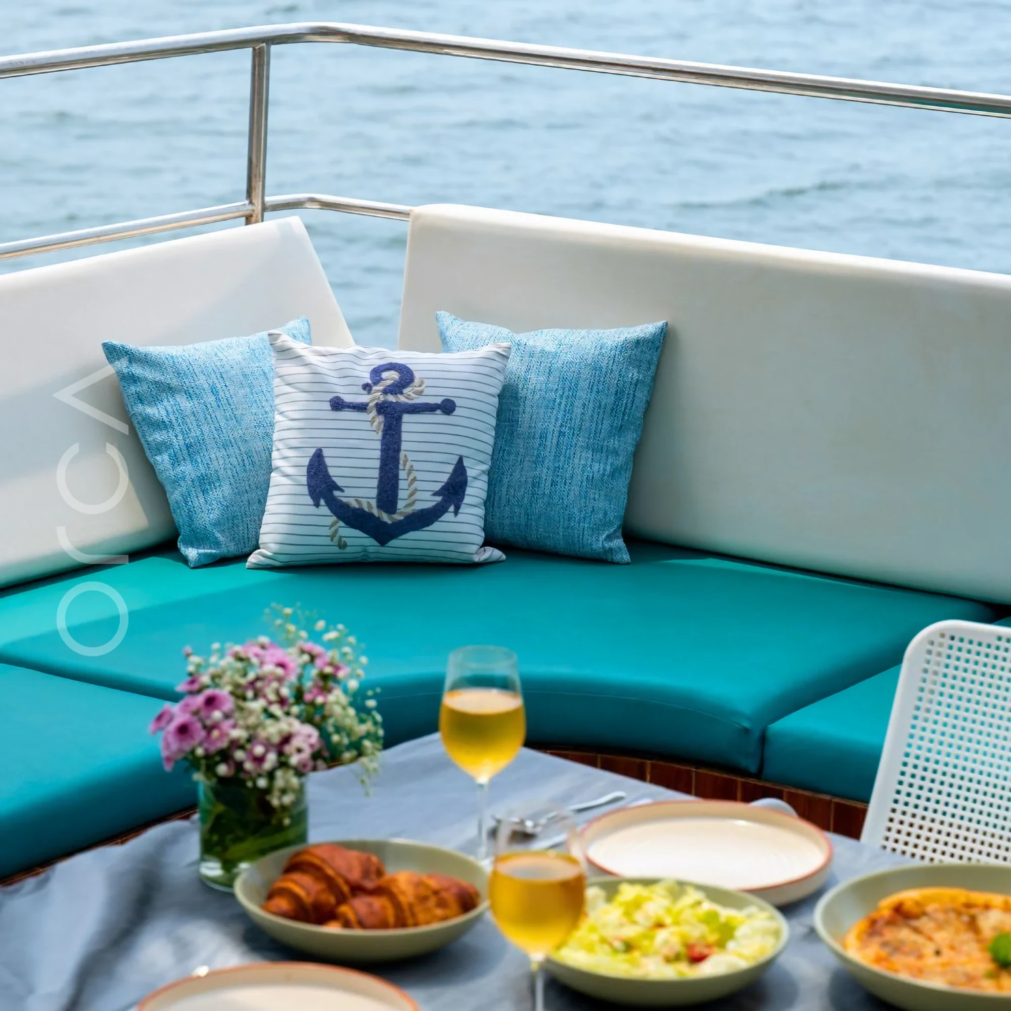 The aft deck of a cruise boat in Goa, available to rent from Orca Sail.