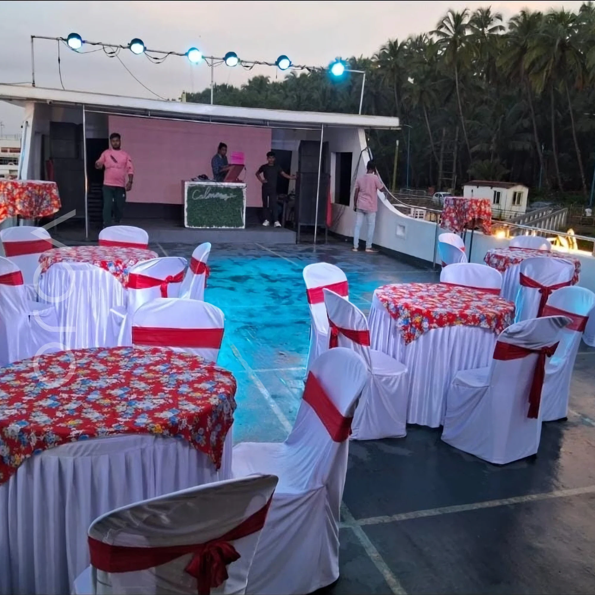 The upper deck and helm area of a cruise boat in Goa, available to rent from Orca Sail.
