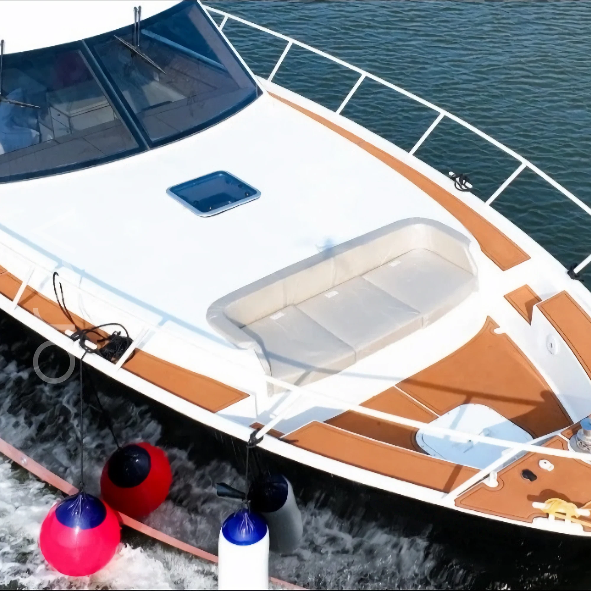 The bow deck of a motor yacht in Goa, available to rent from Orca Sail.