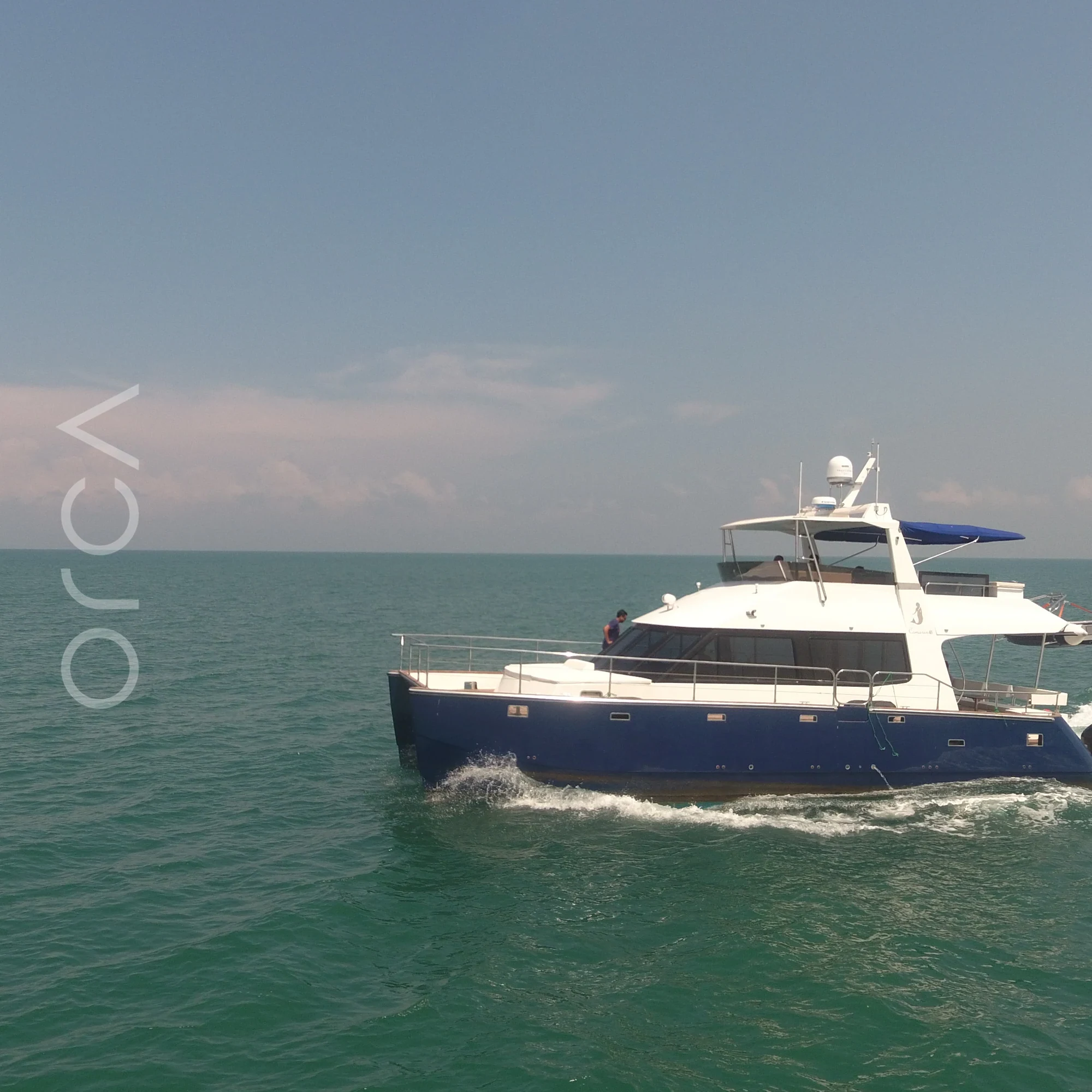 The Catamaran sail yacht catamaran on the water in Goa, available to rent from Orca Sail.