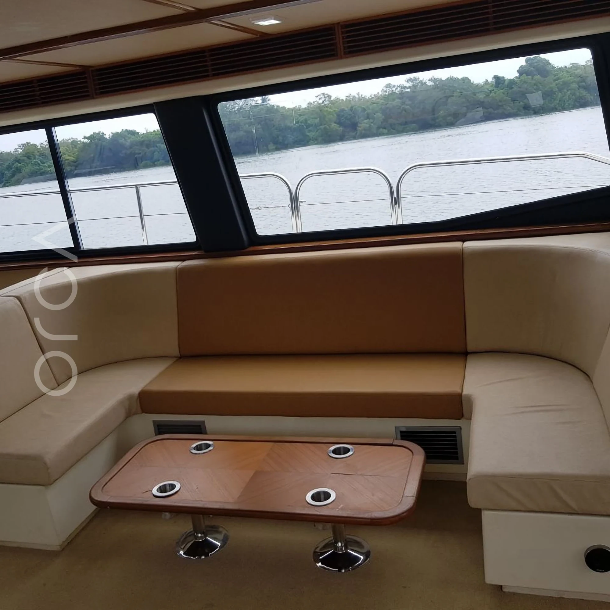 The main seating area aboard a Catamaran sail yacht catamaran in Goa, available to rent from Orca Sail.