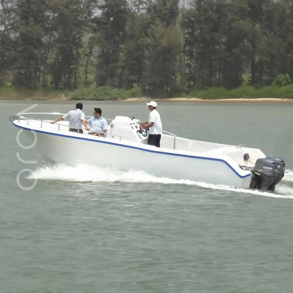 The Rediscovery 26 speedboat under way in Goa, seen side-on, available to rent from Orca Sail.