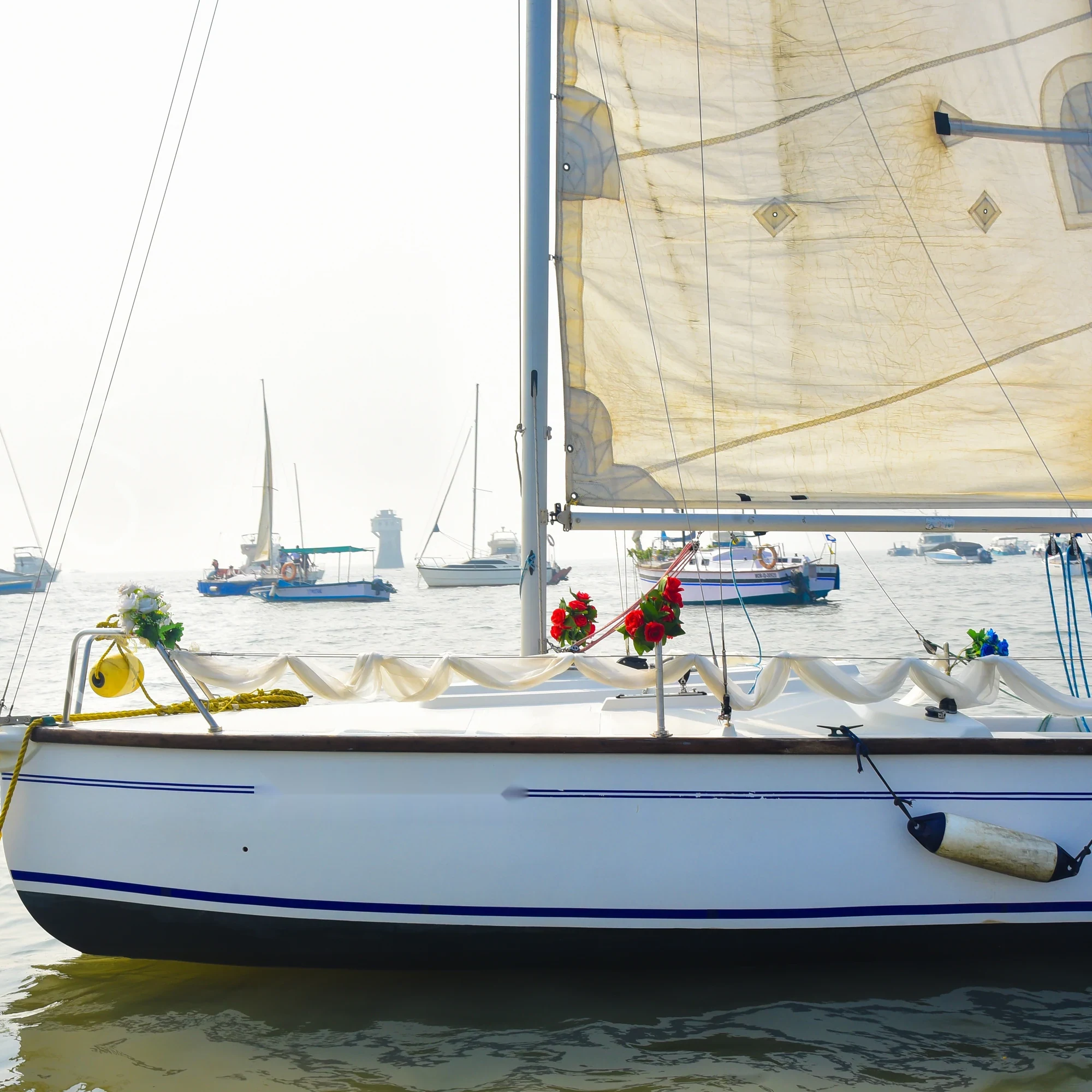 The XS63 sail boat on the water in Mumbai, available to rent from Orca Sail.