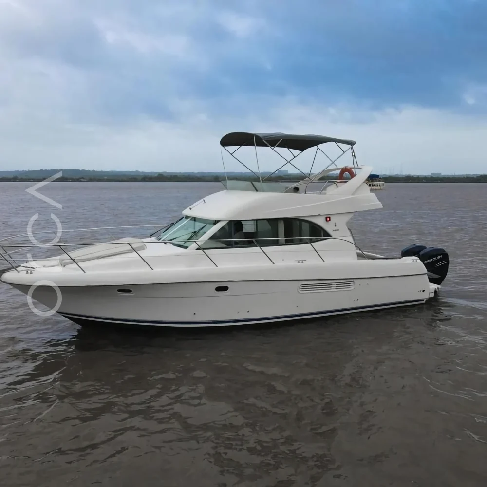 The Prestige 36 motor yacht on the water in Goa, available to rent from Orca Sail.