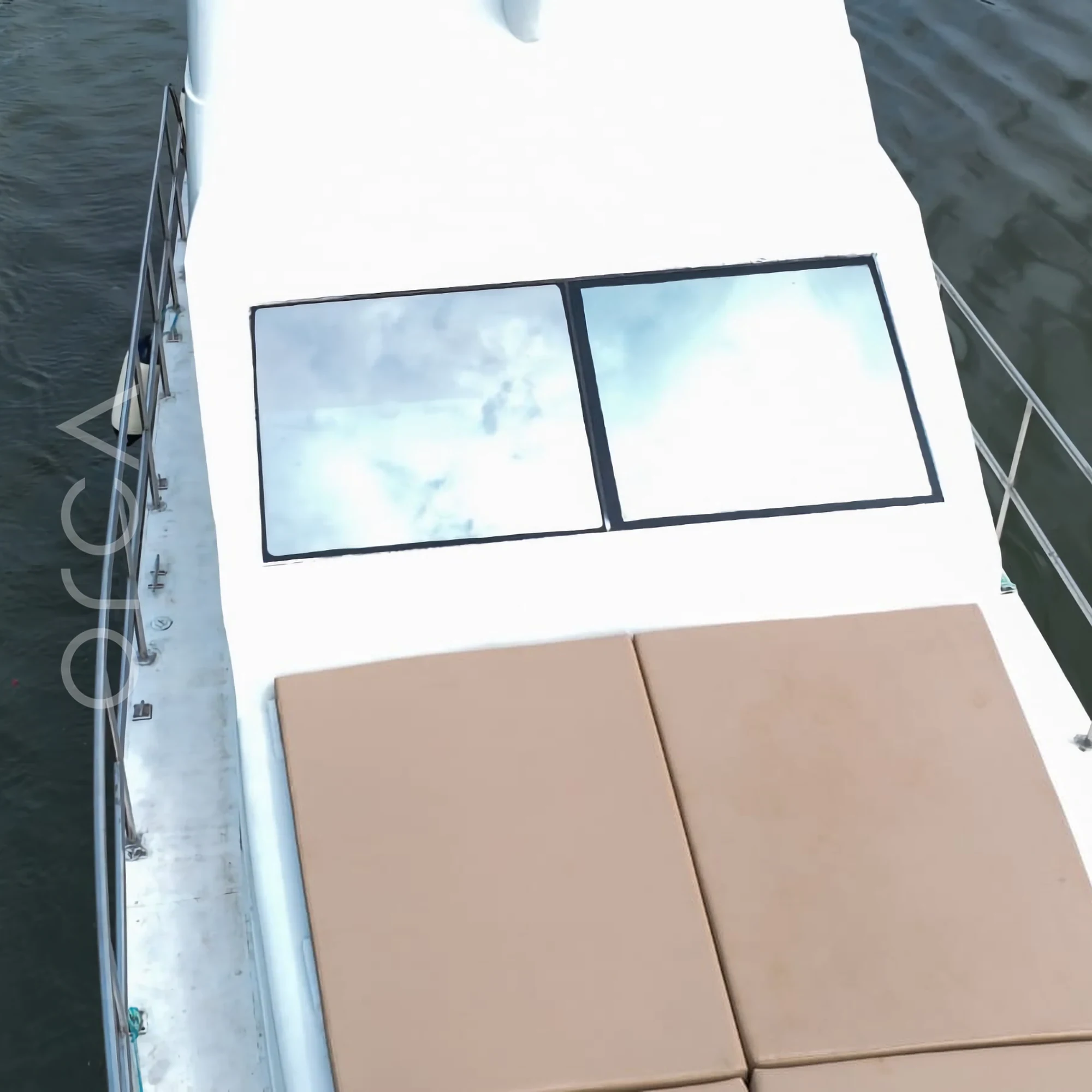 The bow deck of an Oasis motor yacht in Goa, available to rent from Orca Sail.